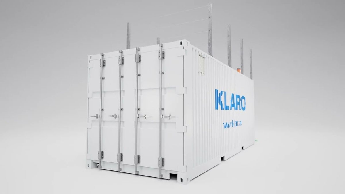 A white 20-foot shipping container converted into a KLARO Container.One mobile wastewater treatment plant, studio render showing ISO corner castings and doors